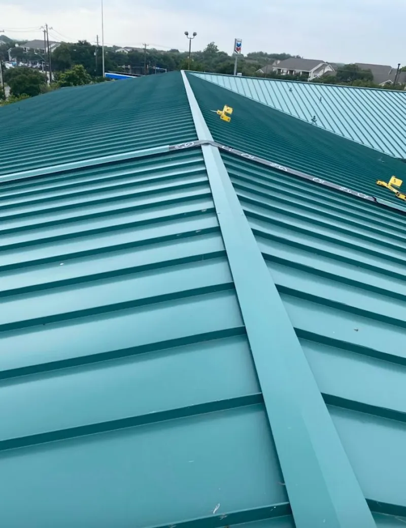 Green commercial metal roof ridge and valley for Metal Roof Repair in Deer Park