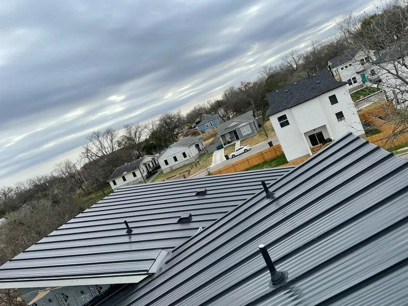 Standing seam metal roof panels with vents for Skylight Repair in Deer Park